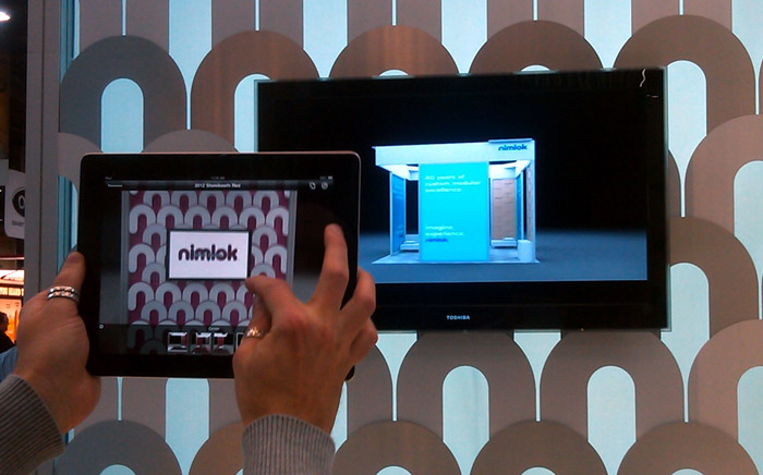 Example of virtual reality building an exhibit on an ipad to entice trade show attendees