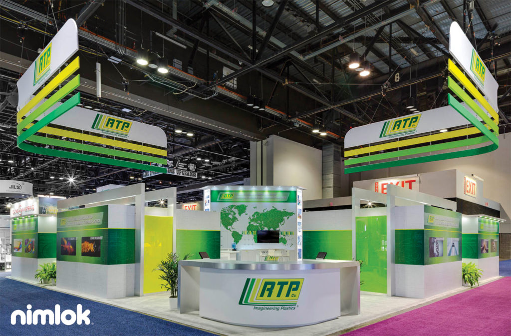 50'x50' island exhibit with custom hanging structures and brand-forward graphics. 